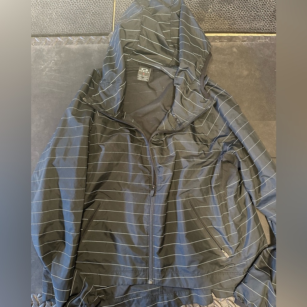 Oakley rain coat, size small, black